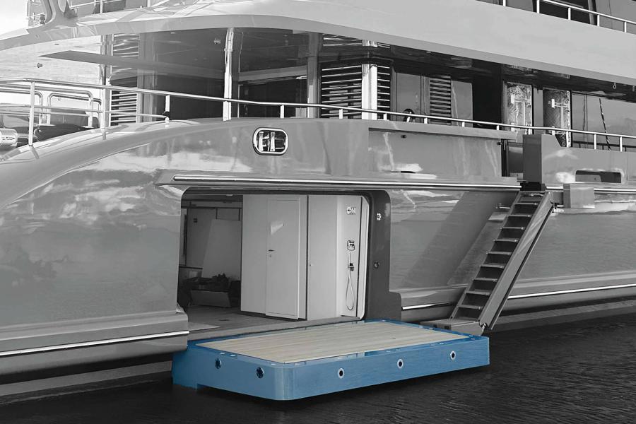 Automatic systems for large garage doors developed with downward opening movement and floating function, installed on a luxury yacht