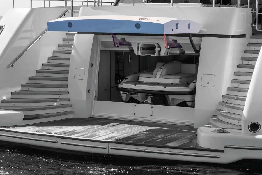 Automatic systems for large side garage doors manufactured with stainless steel hinges and upward opening movement, installed on a yacht